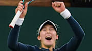 Andreeva celebrates winning match point. 