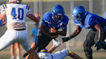 The Barron Collier Cougars competes against the Charlotte Tarpons in a spring football game at Golden Gate High School in Naples on Tuesday, May 21, 2024.