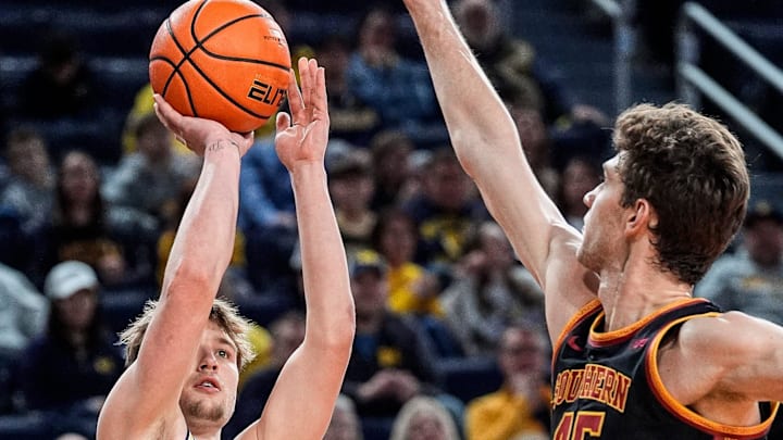 Michigan guard Winters Grady (10) makes a jump shot against USC center Gabe Dynes (45) during the second half at Crisler Center in Ann Arbor on Friday, Jan. 2, 2026.
