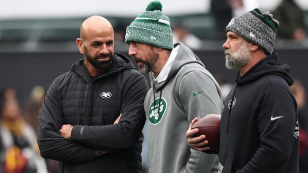 Dec 24, 2023; East Rutherford, New Jersey, USA; New York Jets head coach Robert Saleh (left) talks