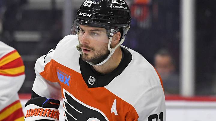 Mar 4, 2025; Philadelphia, Pennsylvania, USA; Philadelphia Flyers center Scott Laughton (21) against the Calgary Flames at Wells Fargo Center. Mandatory Credit: Eric Hartline-Imagn Images