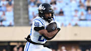 Nov 22, 2025; Chapel Hill, North Carolina, USA; Duke Blue Devils running back Nate Sheppard (20) runs downfield during the first half against The North Carolina Tarat Kenan Stadium. Mandatory Credit: William Howard-Imagn Images