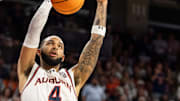 Auburn Tigers forward Johni Broome (4) dunks the ball as Auburn Tigers take on Alabama Crimson Tide at Neville Arena in Auburn, Ala., on Saturday, March 8, 2025. Alabama Crimson Tide defeated Auburn Tigers 93-91.
