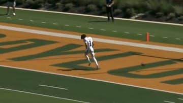 Kansas State receiver Jayce Brown's touchdown was called back after his helmet was ripped off