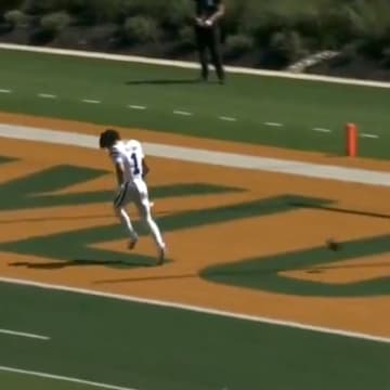 Kansas State receiver Jayce Brown's touchdown was called back after his helmet was ripped off