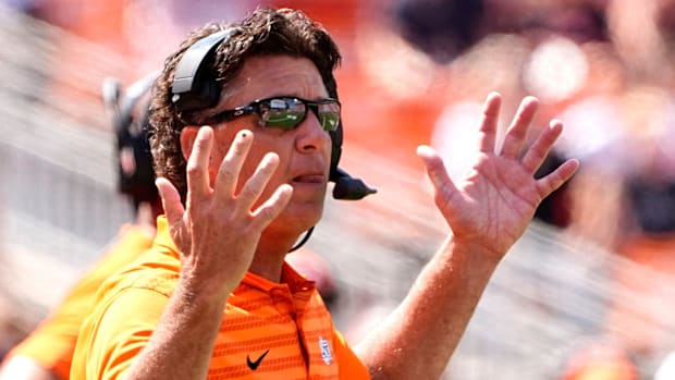 Oklahoma State coach Mike Gundy reacts to a call against Arkansas