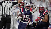 New England Patriots cornerback Marcus Jones celebrates his interception during second half action at Highmark Stadium in Orchard Park on Oct. 5, 2025.