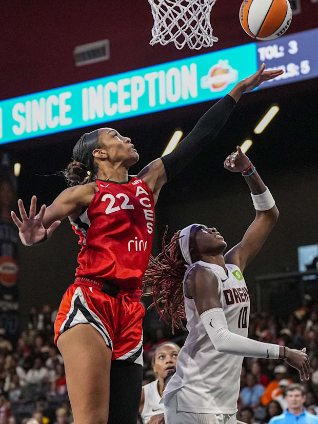 Las Vegas Aces center A'ja Wilson blocks a shot by Atlanta Dream guard Rhyne Howard. 