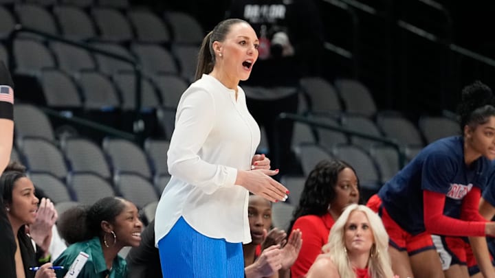 Dec 18, 2022; Dallas, Texas, USA; Arizona Wildcats head coach Adia Barnes reacts against the Baylor Lady Bears during the first half at American Airlines Center. Mandatory Credit: Chris Jones-Imagn Images