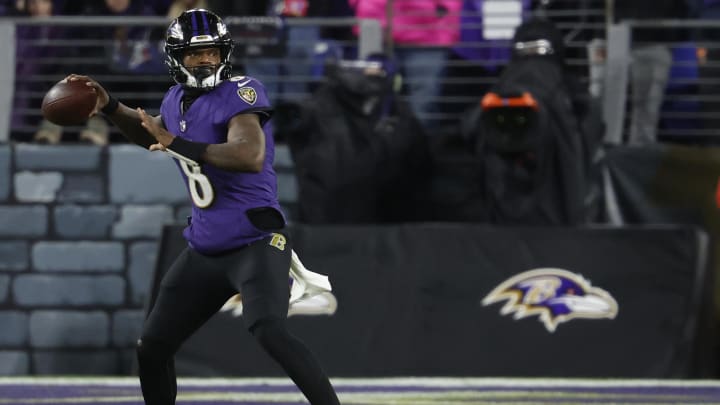 Jan 28, 2024; Baltimore, Maryland, USA; Baltimore Ravens quarterback Lamar Jackson (8) passes the ball against the Kansas City Chiefs in the AFC Championship football game at M&T Bank Stadium. Mandatory Credit: Geoff Burke-USA TODAY Sports