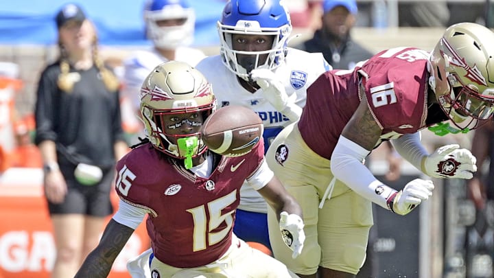 Sep 14, 2024; Tallahassee, Florida, USA; Florida State Seminoles wide receiver Lawayne McCoy (15) fumbles a punt return against the Memphis Tigers during the first half at Doak S. Campbell Stadium. Mandatory Credit: Melina Myers-Imagn Images