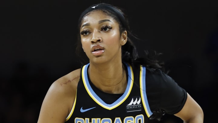Jun 23, 2024; Chicago, Illinois, USA; Chicago Sky forward Angel Reese (5) looks to pass the ball against the Indiana Fever during the second half of a basketball game at Wintrust Arena. Mandatory Credit: Kamil Krzaczynski-USA TODAY Sports
