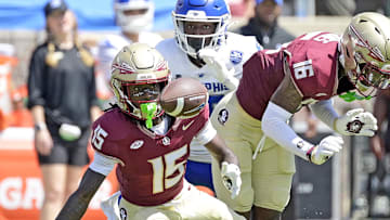 Sep 14, 2024; Tallahassee, Florida, USA; Florida State Seminoles wide receiver Lawayne McCoy (15) fumbles a punt return against the Memphis Tigers during the first half at Doak S. Campbell Stadium. Mandatory Credit: Melina Myers-Imagn Images