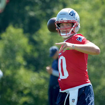Quarterback Drake Maye throws during practice on the opening day of New England Patriots training camp on July 23, 2025, at Gillette Stadium in Foxboro, Massachusetts.