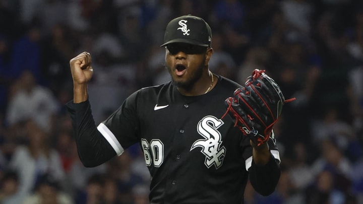 Chicago White Sox relief pitcher Gregory Santos (60) celebrates a win against the Chicago Cubs at Wrigley Field in 2023.