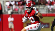 Oct 4, 2025; Tuscaloosa, Alabama, USA; Alabama Crimson Tide tight end Josh Cuevas (80) avoids Vanderbilt Commodores safety Randon Fontenette (2) during the first quarter at Saban Field at Bryant-Denny Stadium. Mandatory Credit: David Leong-Imagn Images