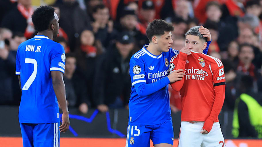 Gianluca Prestianni (right) covering his mouth.