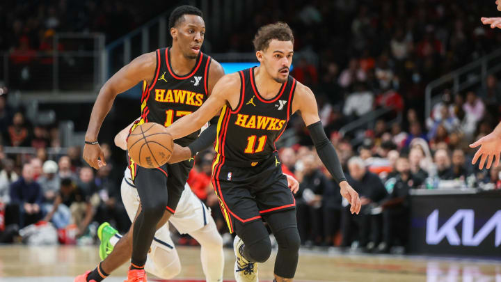 Dec 11, 2023; Atlanta, Georgia, USA; Atlanta Hawks guard Trae Young (11) dribbles against the Denver Nuggets in the second half at State Farm Arena. Mandatory Credit: Brett Davis-USA TODAY Sports