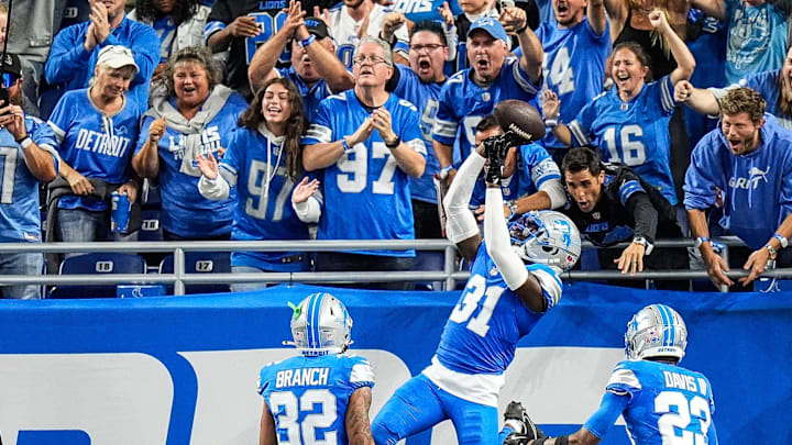 Detroit Lions safety Kerby Joseph (31) celebrates an interception against Los Angeles Rams during the first half at Ford Field in Detroit on Sunday, September 8, 2024. Detroit Lions safety Kerby Joseph (31) celebrates an interception against Los Angeles Rams during the first half at Ford Field in Detroit on Sunday, September 8, 2024.