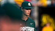 Michigan State pitcher Joseph Dzierwa (16) returns to the dugout after closing out an inning during a NCAA Big Ten Conference baseball game against Iowa, Friday, May 12, 2023, at Duane Banks Field in Iowa City, Iowa.
