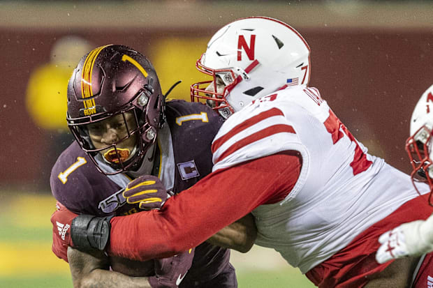 Nebraska's Darrion Daniels makes a tackle against Minnesota in 2019.