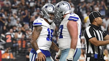 Aug 17, 2024; Paradise, Nevada, USA; Dallas Cowboys quarterback Trey Lance (19) celebrates his touchdown with center Brock Hoffman (67) against the Las Vegas Raiders in the fourth quarter at Allegiant Stadium. Mandatory Credit: Candice Ward-Imagn Images
