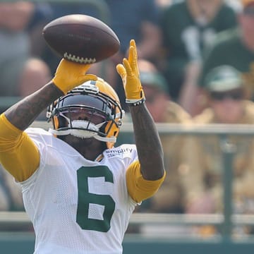 Green Bay Packers wide receiver Mecole Hardman (6) catches a pass at training camp.
