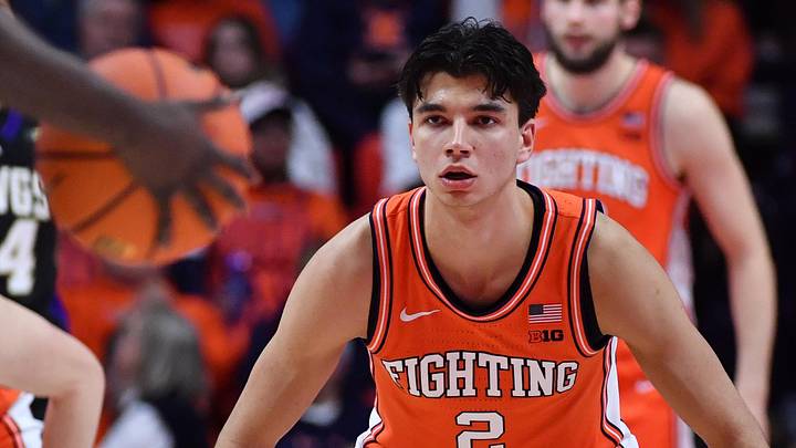 Jan 29, 2026; Champaign, Illinois, USA;  Illinois Fighting Illini guard Andrej Stojakovic (2) watches the dribble of Washington Huskies guard Zoom Diallo (5) during the first half at State Farm Center. Mandatory Credit: Ron Johnson-Imagn Images