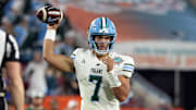 Dec 20, 2024; Tampa, FL, USA;  Tulane Green Wave quarterback Ty Thompson (7) throws the ball against the Florida Gators during the second half at Raymond James Stadium. 