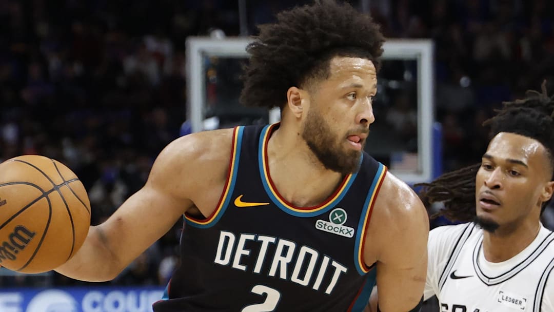 Feb 23, 2026; Detroit, Michigan, USA;  Detroit Pistons guard Cade Cunningham (2) dribbles on San Antonio Spurs guard Stephon Castle (5) in the second half at Little Caesars Arena. Mandatory Credit: Rick Osentoski-Imagn Images