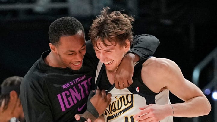 Team Detlef forward Matas Buzelis, right, of the G League Ignite celebrates with a teammate after hitting the winning shot during a Rising Stars semifinal game at Gainbridge Fieldhouse, Feb. 16, 2024 in Indianapolis.