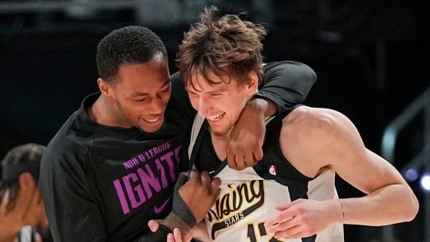 Team Detlef forward Matas Buzelis, right, of the G League Ignite celebrates with a teammate after hitting the winning shot during a Rising Stars semifinal game at Gainbridge Fieldhouse, Feb. 16, 2024 in Indianapolis.