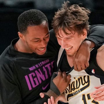 Team Detlef forward Matas Buzelis (13) of the G League Ignite celebrates with a teammate after hitting the game-winning shot Friday, Feb. 16, 2024, during the 2024 Panini Rising Stars Game at Gainbridge Fieldhouse in downtown Indianapolis.