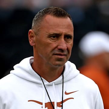 Oct 25, 2025; Starkville, Mississippi, USA; Texas Longhorns head coach Steve Sarkisian looks on during warm ups prior to the game against the Mississippi State Bulldogs at Davis Wade Stadium at Scott Field. Mandatory Credit: Petre Thomas-Imagn Images