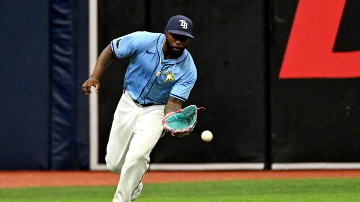 May 26, 2024; St. Petersburg, Florida, USA; Tampa Bay Rays left fielder Randy Arozarena (56) fields the ball in the second inning against the Kansas City Royals at Tropicana Field. Mandatory Credit: Jonathan Dyer-USA TODAY Sports