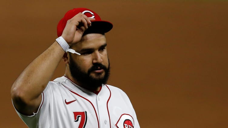 Cincinnati Reds third baseman Eugenio Suarez (7) returns to the dugout.