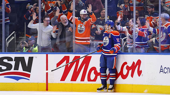 Nov 14, 2024; Edmonton, Alberta, CAN; Edmonton Oilers forward Connor McDavid (97) celebrates after scoring a goal during the second period, his 1000th NHL point against the Nashville Predators at Rogers Place. Mandatory Credit: Perry Nelson-Imagn Images Nov 14, 2024; Edmonton, Alberta, CAN; Edmonton Oilers forward Connor McDavid (97) celebrates after scoring a goal during the second period, his 1000th NHL point against the Nashville Predators at Rogers Place. Mandatory Credit: Perry Nelson-Imagn Images