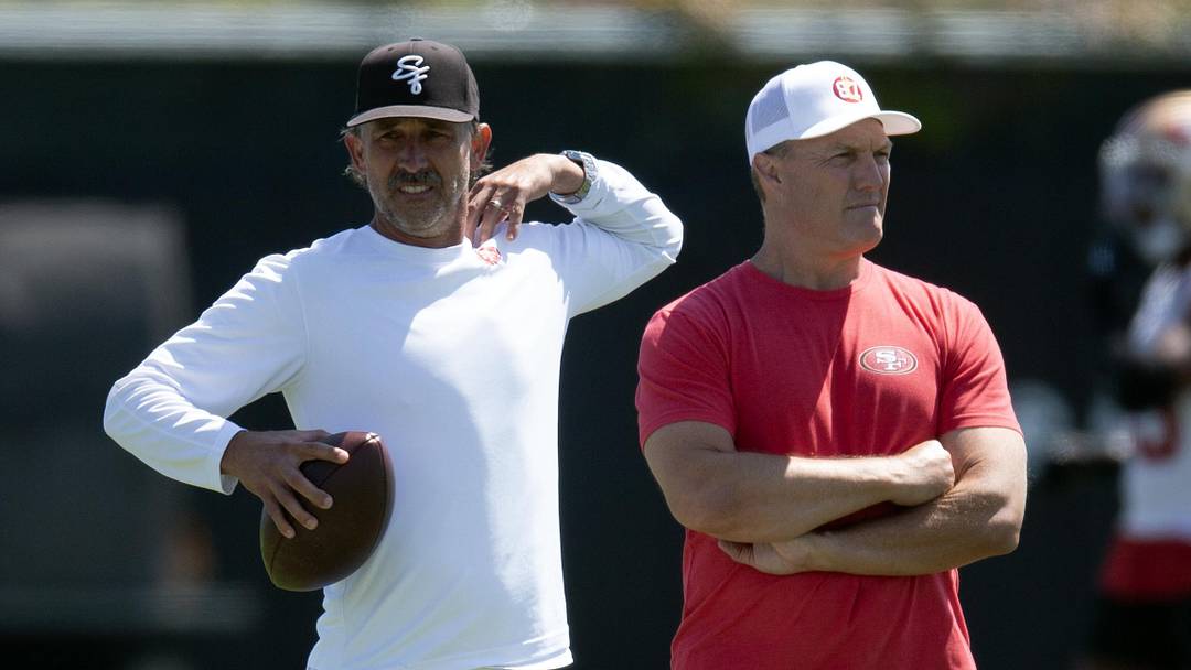 Jun 10, 2025; Santa Clara, CA, USA; San Francisco 49ers head coach Kyle Shanahan (left) and general manager John Lynch watch their team work out during an OTA at Levi's Stadium. Mandatory Credit: D. Ross Cameron-Imagn Images Jun 10, 2025; Santa Clara, CA, USA; San Francisco 49ers head coach Kyle Shanahan (left) and general manager John Lynch watch their team work out during an OTA at Levi's Stadium. Mandatory Credit: D. Ross Cameron-Imagn Images