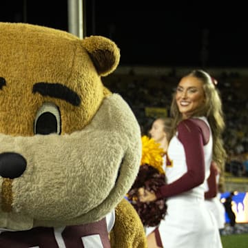 Sep 13, 2025; Berkeley, California, USA; The Minnesota Golden Gopher mascot teases a photographer during the second quarter against the California Golden Bears at California Memorial Stadium. Mandatory Credit: D. Ross Cameron-Imagn Images