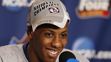 Apr 7, 2008; San Antonio, TX, USA; Kansas Jayhawks guard Mario Chalmers (15) smiles as he addresses reporters at a press conference after the finals of the 2008 NCAA Mens Final Four Championship against the Memphis Tigers at the Alamodome.  Kansas defeated Memphis 75-68 in overtime to win the national championship. Mandatory Credit: Bob Donnan-Imagn Images