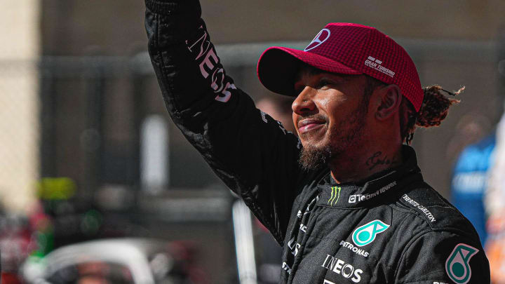 Mercedes AMG Petronas driver Lewis Hamilton waves to the fans after after a second place podium finish in the Formula 1 Lenovo United States Grand Prix at Circuit of Americas on Sunday Oct. 22, 2023.