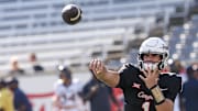 Nov 1, 2025; Houston, Texas, USA;  Houston Cougars quarterback Conner Weigman (1) warms up before play9ng against the West Virginia Mountaineers at TDECU Stadium. Mandatory Credit: Thomas Shea-Imagn Images