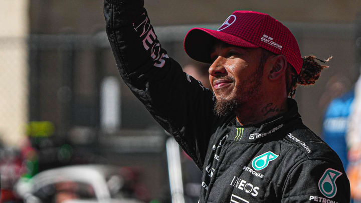 Mercedes AMG Petronas driver Lewis Hamilton waves to the fans after after a second place podium finish in the Formula 1 Lenovo United States Grand Prix at Circuit of Americas on Sunday Oct. 22, 2023.