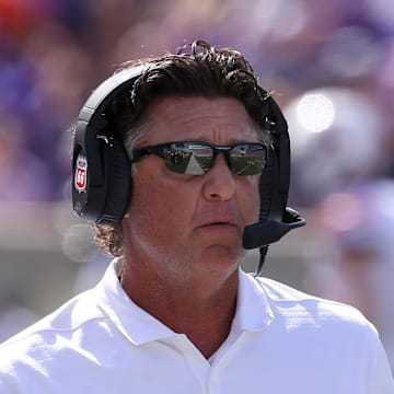 Sep 28, 2024; Manhattan, Kansas, USA; Oklahoma State Cowboys head coach Mike Gundy paces the sideline during a timeout  against the Kansas State Wildcats at Bill Snyder Family Football Stadium. Mandatory Credit: Scott Sewell-Imagn Images