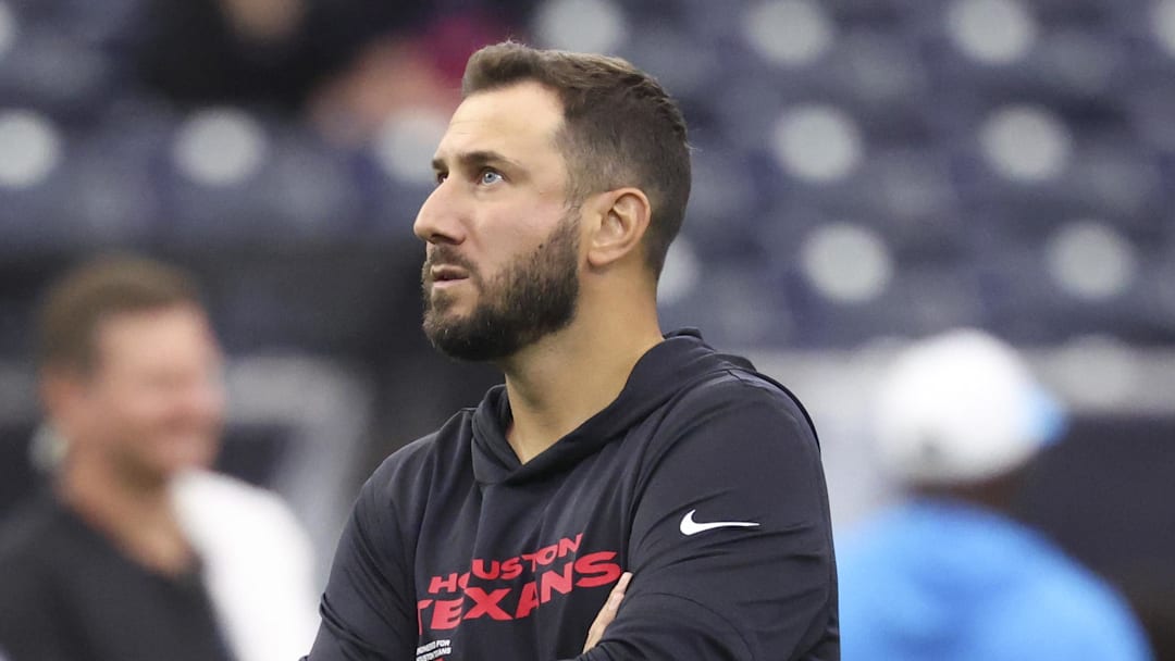 Aug 16, 2025; Houston, Texas, USA; Houston Texans offensive coordinator Nick Caley stands on the field before the game against the Carolina Panthers at NRG Stadium. Mandatory Credit: Troy Taormina-Imagn Images