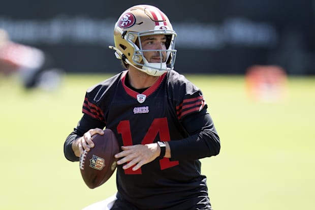 San Francisco 49ers quarterback Tanner Mordecai (14) practices his footwork during a team OTA at Levi's Stadium.