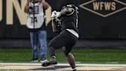 Nov 8, 2024; Winston-Salem, North Carolina, USA; Wake Forest Demon Deacons running back Demond Claiborne (1) catches a pass on a flea flicker against the California Golden Bears during the first half at Allegacy Federal Credit Union Stadium. Mandatory Credit: Jim Dedmon-Imagn Images