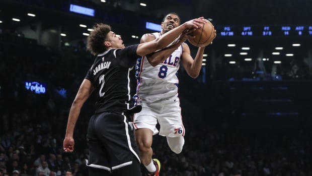 Apr 20, 2023; Brooklyn, New York, USA; Philadelphia 76ers guard De'Anthony Melton (8) looks to drive past Brooklyn Nets forward Cameron Johnson (2) during game three of the 2023 NBA playoffs at Barclays Center. Mandatory Credit: Wendell Cruz-USA TODAY Sports