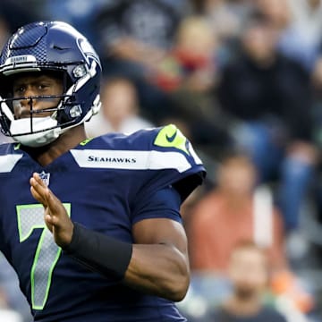 Aug 24, 2024; Seattle, Washington, USA; Seattle Seahawks quarterback Geno Smith (7) passes against the Cleveland Browns during the first quarter at Lumen Field. 