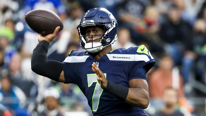 Aug 24, 2024; Seattle, Washington, USA; Seattle Seahawks quarterback Geno Smith (7) passes against the Cleveland Browns during the first quarter at Lumen Field. 